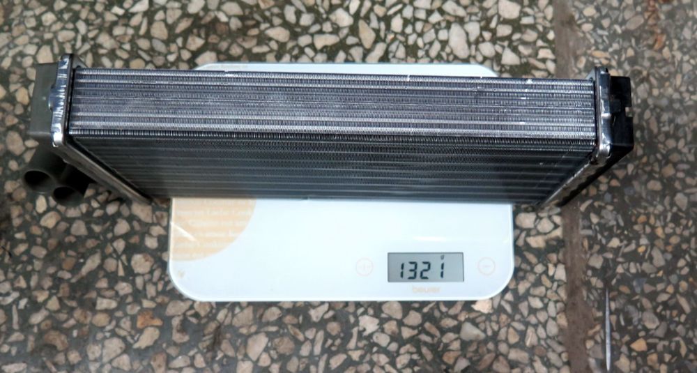 Радиатор отопителя А100 4А Behr Hella