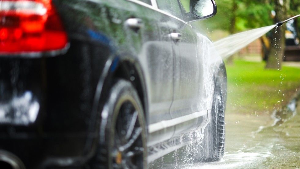 Car Washing on Back Yard. Transportation Photo Collection.