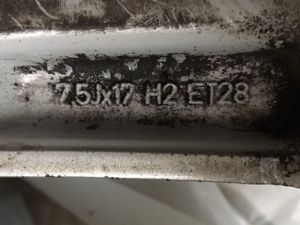 73671
