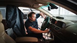 On-board computer tuning by serviceman at garage