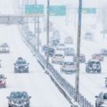 Snowstorm on the Highway during the Rush Hour