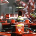 Ferrari Formula One driver Felipe Massa of Brazil drives off with the fuel hose still attached after a pit stop during the Singapore F1 Grand Prix at the Marina Bay circuit