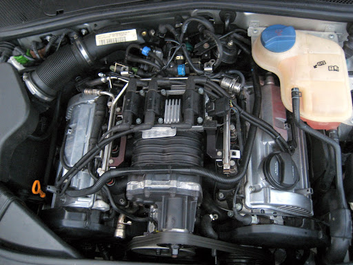 Двигатели audi 2.8. Supercharger Audi 2.8. Ауди 4.2 компрессор. Ауди 2.8 компрессор. Ауди двигатель 2.8 ALG.